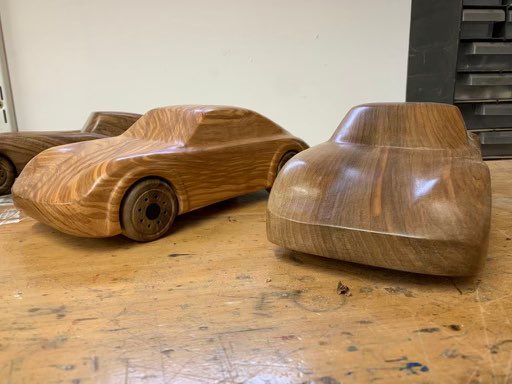 Ogbert1's tweet photo. These visits to my friend are going to get expensive with Christmas coming up! Gorgeous E-Type just finished plus a Porsch 911 - both handmade from wood salvaged while refurbishing antique flooring. Amazing and unique. #toftworkshop @carartbyemily @sarahcrabtreee @CandSCmagazine https://t.co/1dlol4O3Xo