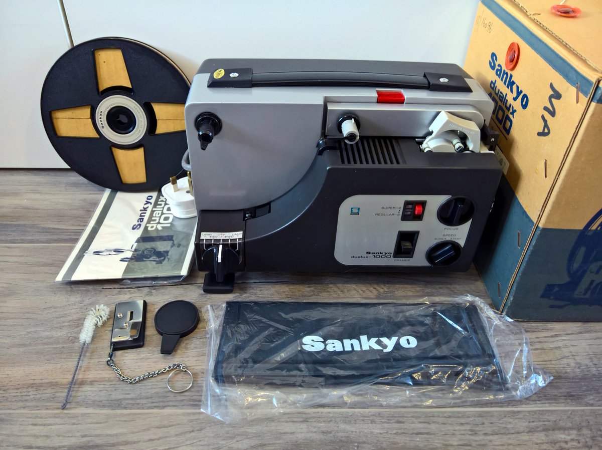OldFilmCompany's tweet photo. Now in stock the Sankyo Dualux 1000 Dual 8 Silent #Projector for #Standard8mm, #Single8 &amp; #Super8mm #cinefilms. With a reel capacity of 400ft &amp; variable speed control from 14 to 22 fps along with an freezeframe function it's ideal for your #HomeMovies. https://t.co/BFEUNYrIoY https://t.co/4PPwqJfUWz