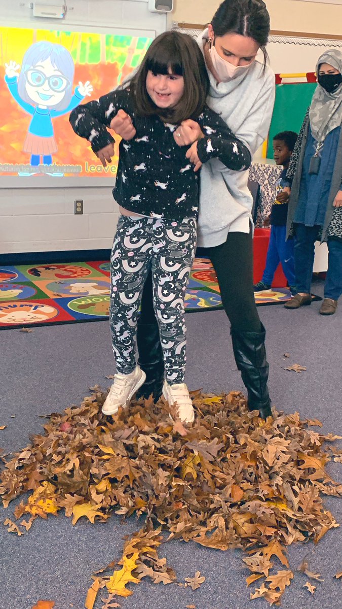 We had a fun fall day. We went outside, collected leaves, brought them inside, raked them into a pile, and OF COURSE jumped in! 🍁