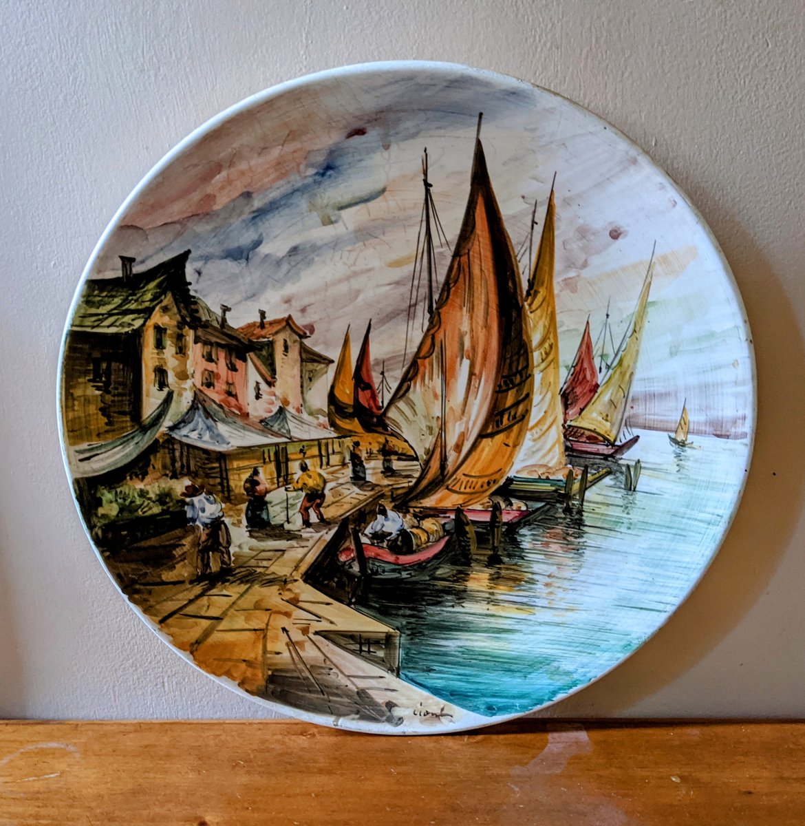 I love these plates!  I'm trying to stay away from heavy pieces, but I couldn't resist!  Handpainted, Italian and Spectacular!!!  At 15' they will definitely draw attention.  This whimsical thing is a tough road.  I buy what grabs me and it isn't always practical.