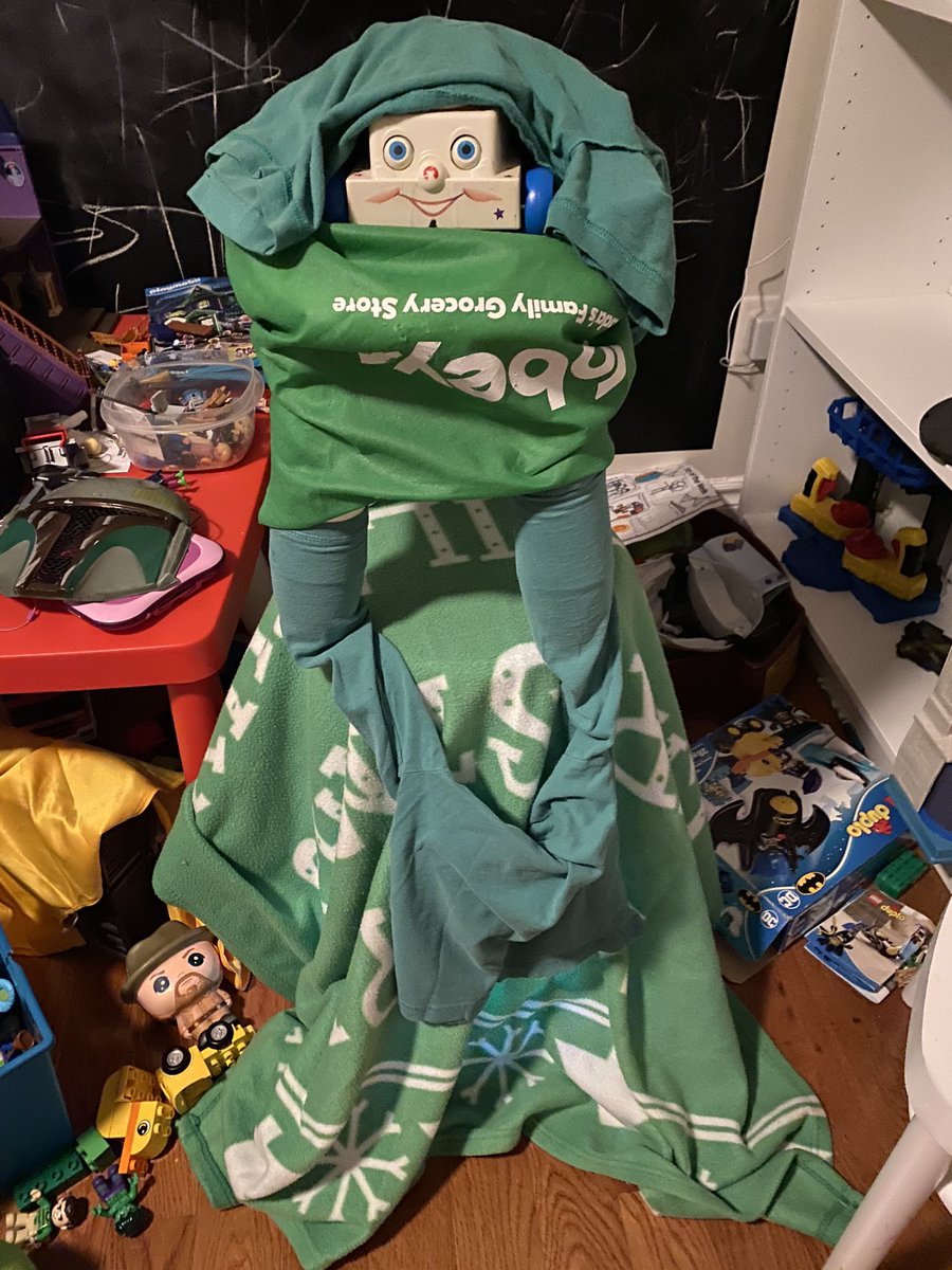 Renee__Horton's tweet photo. Kids created their own @WoodyXmasTree using the old Fisher Price phone, green blankets and @Sobeys bags. Youngest boy hid in the nearby closet and asks “what would you like for Xmas”. It’s the full N.S. experience #Woodythetalkingchristmastree https://t.co/X6kRjeyv68