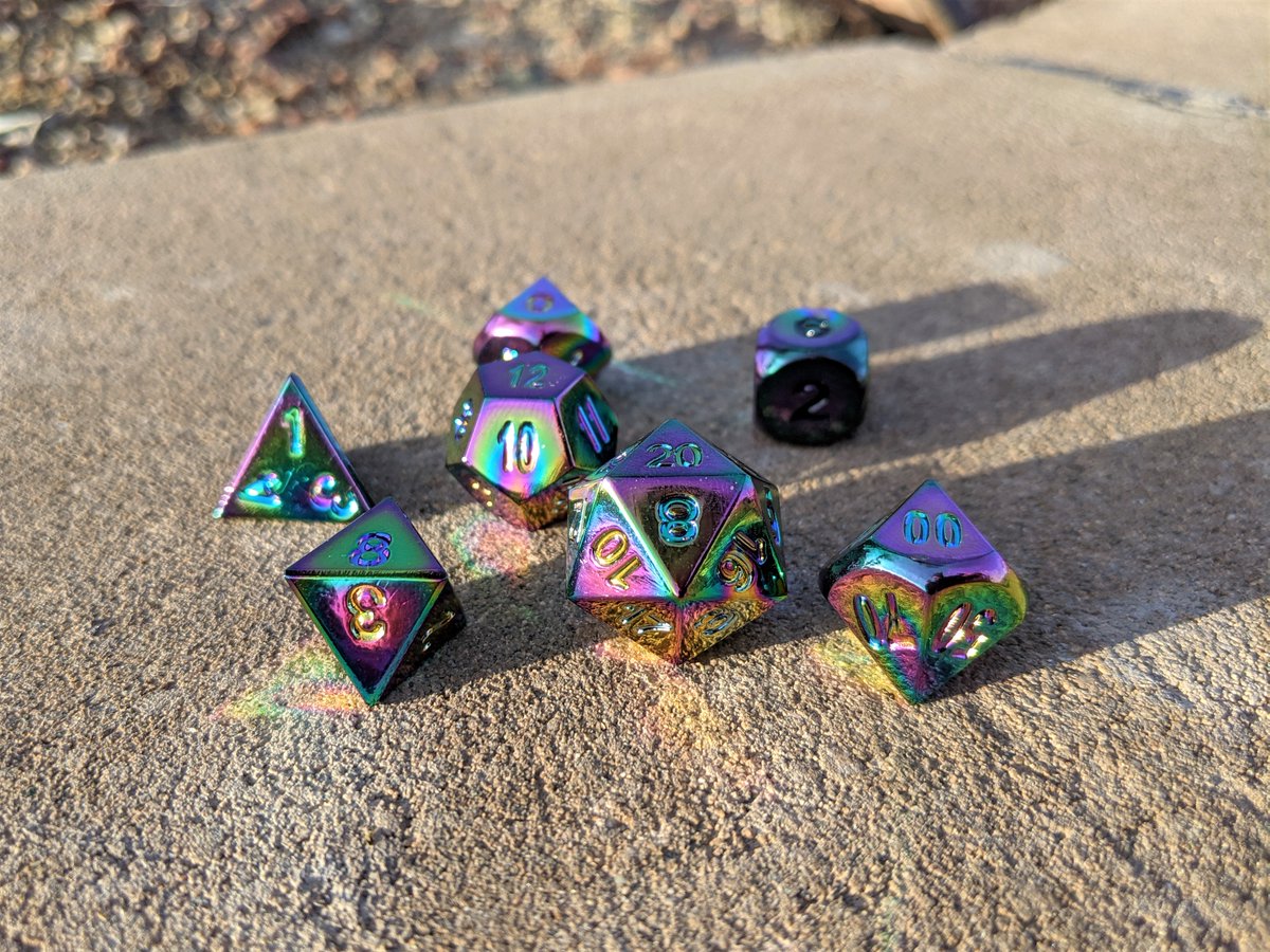 DropTheDie's tweet photo. 🍀Dice Giveaway!👻

The Ghost of Christmas Past offers you these original @DieHardDice Scorched Rainbow metal dice.

NO LONGER FOR SALE, these hefty sweethearts can bring a rainbow to your games year round.

Follow + Like + Retweet to enter! 
Comments welcome :D
Rules below ⬇️ https://t.co/GkYyrozI7D