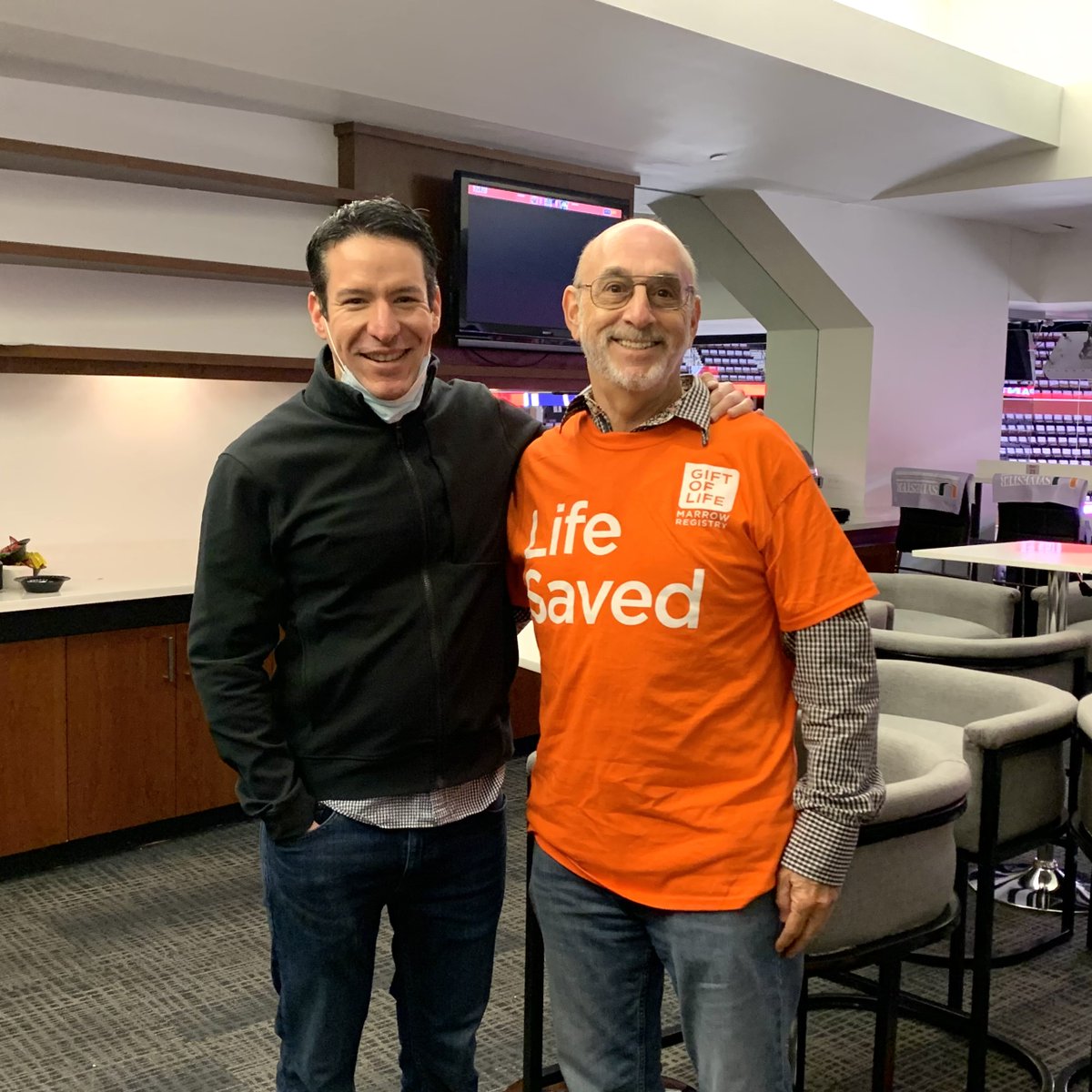 SylvesterCancer's tweet photo. At the @FlaPanthers game with Dr. Antonio Jimenez (@amjimenezmd) and stem cell patient Neil Fried, as he meets his donor Chad Campo. @GiftofLife brought them together before taking the ice for the puck drop! ๐ #HockeyFightsCancer #BeaMatch https://t.co/nqc3cuhvCo