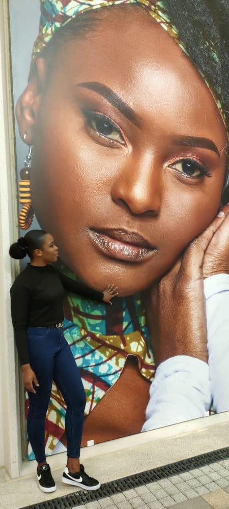 RumbieCatness's tweet photo. A friend travelled to Dubai and took a picture on my picture. Mama the beauty you gave me is now international standard 😂😍 #DubaiExpo2020 #Dubai #model #internationalmodel 🤭 https://t.co/ZdIXinTAaw