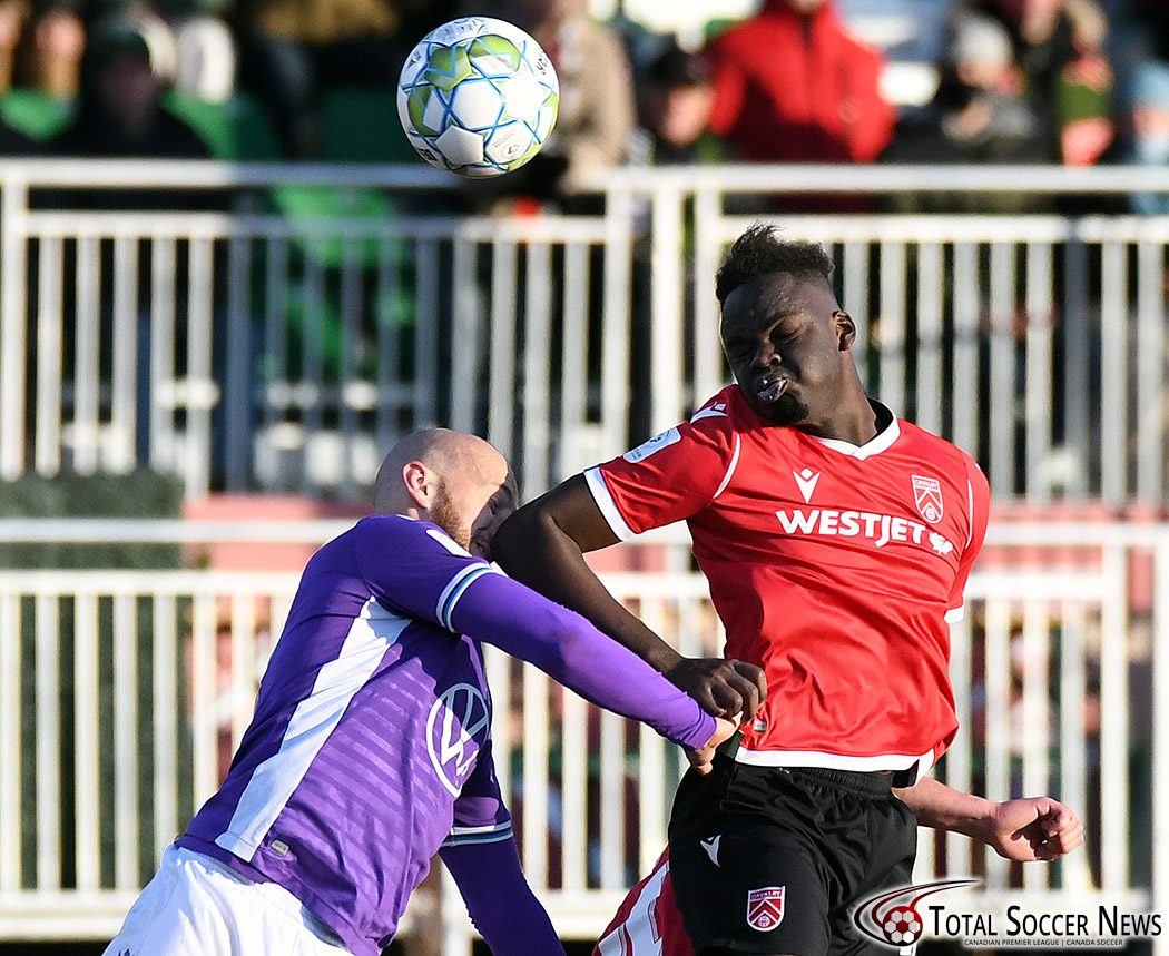 StuartGradon's tweet photo. Cause and effect.

Pacific FC's Jordan Haynes takes an elbow to the nose from Karifa Yao during the Canadian Premier League semifinal versus Cavalry FC Saturday.

More match photos: https://t.co/9EUlHJY6R7

#CanPL #CanPLPlayoffs https://t.co/idz3MOthZO
