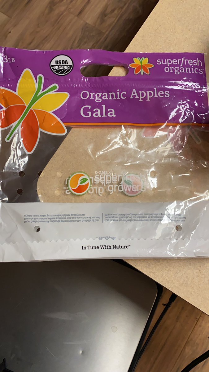 The_Jill's tweet photo. #usdaorganic apples. “ #intunewithnature “ , “ #blueskiescleanwater “ in a non- #recycling plastic bag???   #eatapples https://t.co/5j4jR7DAnJ