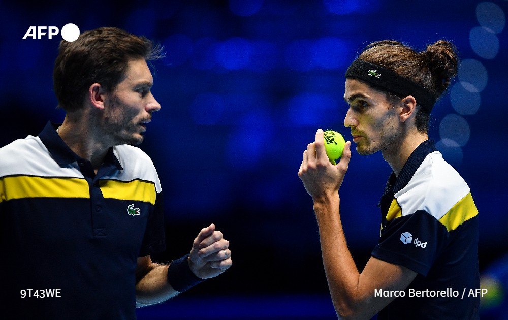 afpfr's tweet photo. 🎾 Tennis: Mahut et Herbert sacrés pour la 2e fois aux Masters de double #AFP https://t.co/KKh35loW8h