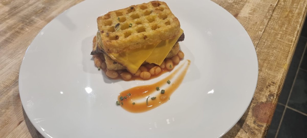 Kernowic's tweet photo. A brace of potato and onion croquettes engorged with seasoned pork tubuli and colonial fromage, atop a bed of haricot and tomato ragu. #RateMyPlate https://t.co/oYh9RcbHKB