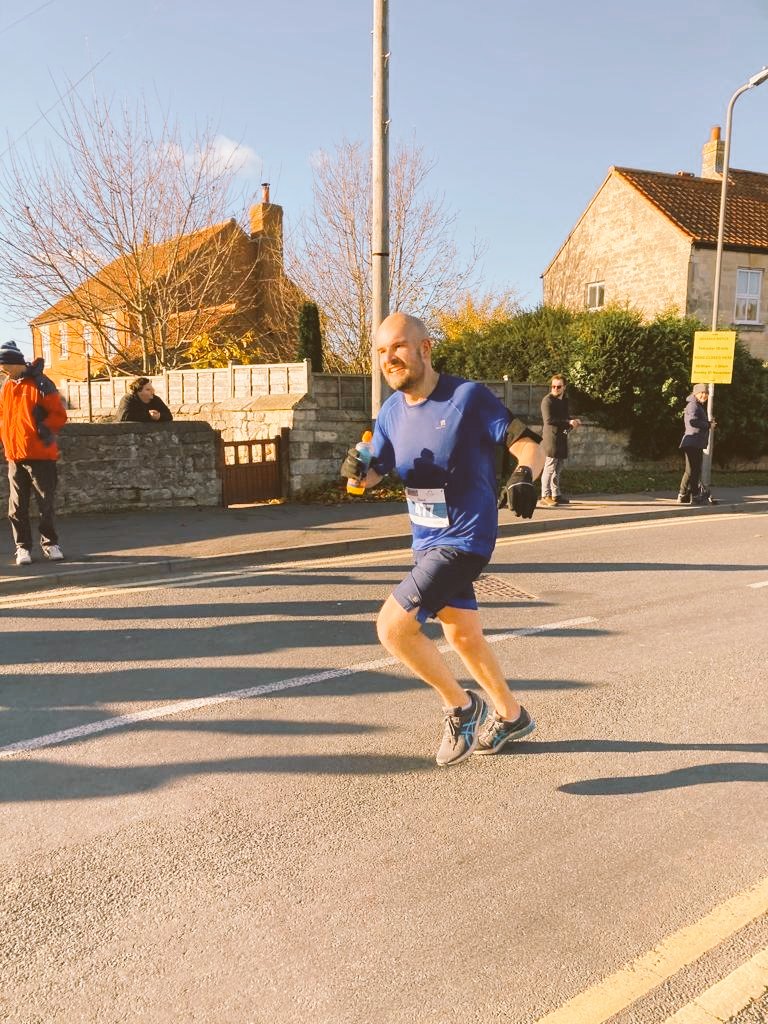 Padmore's tweet photo. 10 mile PB in the Tadcaster 10 today! That's 12 minutes quicker than when I last ran it in 2019. After a quiet few weeks post marathon I've gradually increased my distance recently. Next goal is 1000 miles for the year and I've got some exciting plans for 2022! #Running https://t.co/SZnQnB7Sto