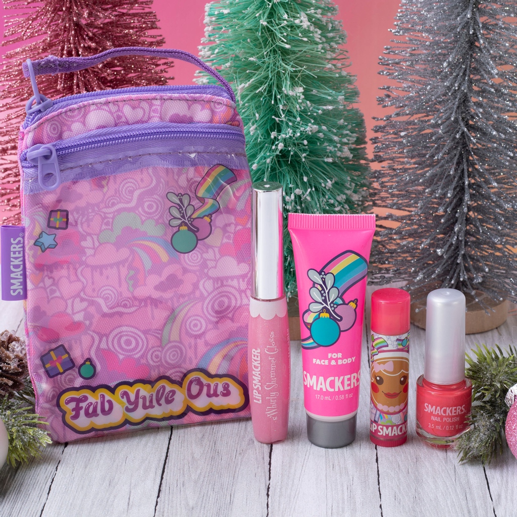 It's #NationalGingerbreadCookieDay 😍 Celebrate with our NEW Holiday Glam Bag and it's gingerbread flavored lip balm! Available NOW at Target. #lipsmacker #smackers #bestflavorforever