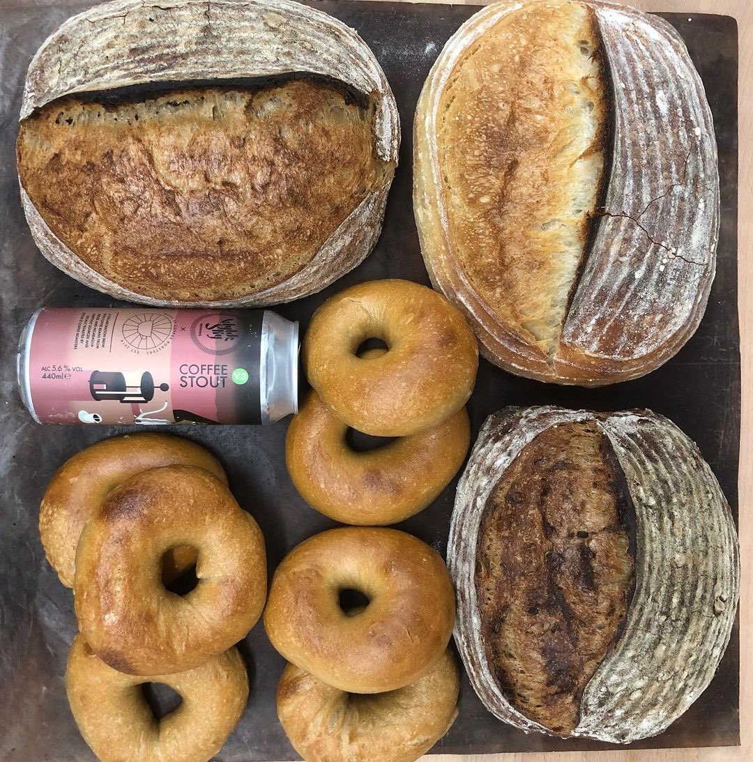 Look at what @kbroffee delivered this week!! 

“Sourdoughs all delivered thank you for your orders.” Find your local Bread Angel to order real bread like this!!

Whites|Country Malt|Beer using <a href="/wyldeskybrewing/">Wylde Sky Brewing</a> coffee Stout @woodstcoffeel bagels 🥯|Cinnamon Buns|Raspberry Muffins