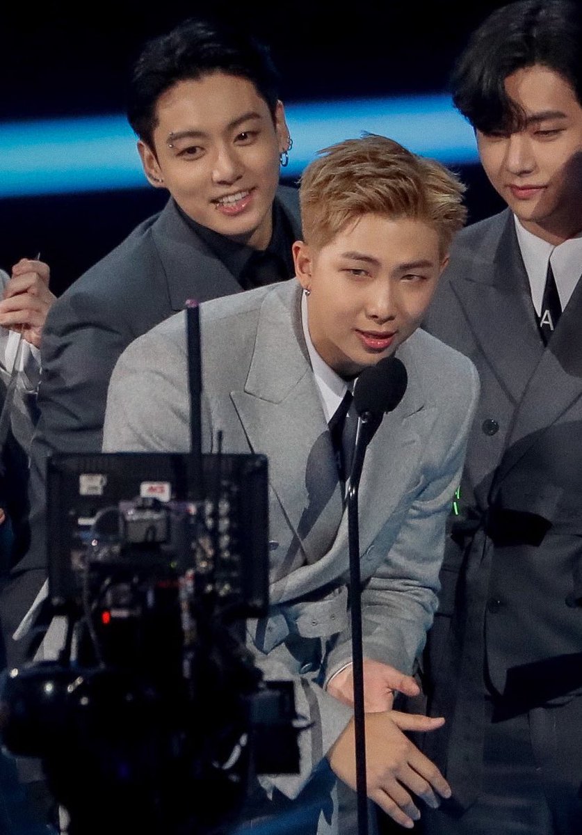 jooniesloops's tweet photo. and there it is, namjoon’s best boy smile ☺️ #RM #BTSxAMAs #AMAsTNT BTS @BTS_twt https://t.co/0g4a7Ycq46