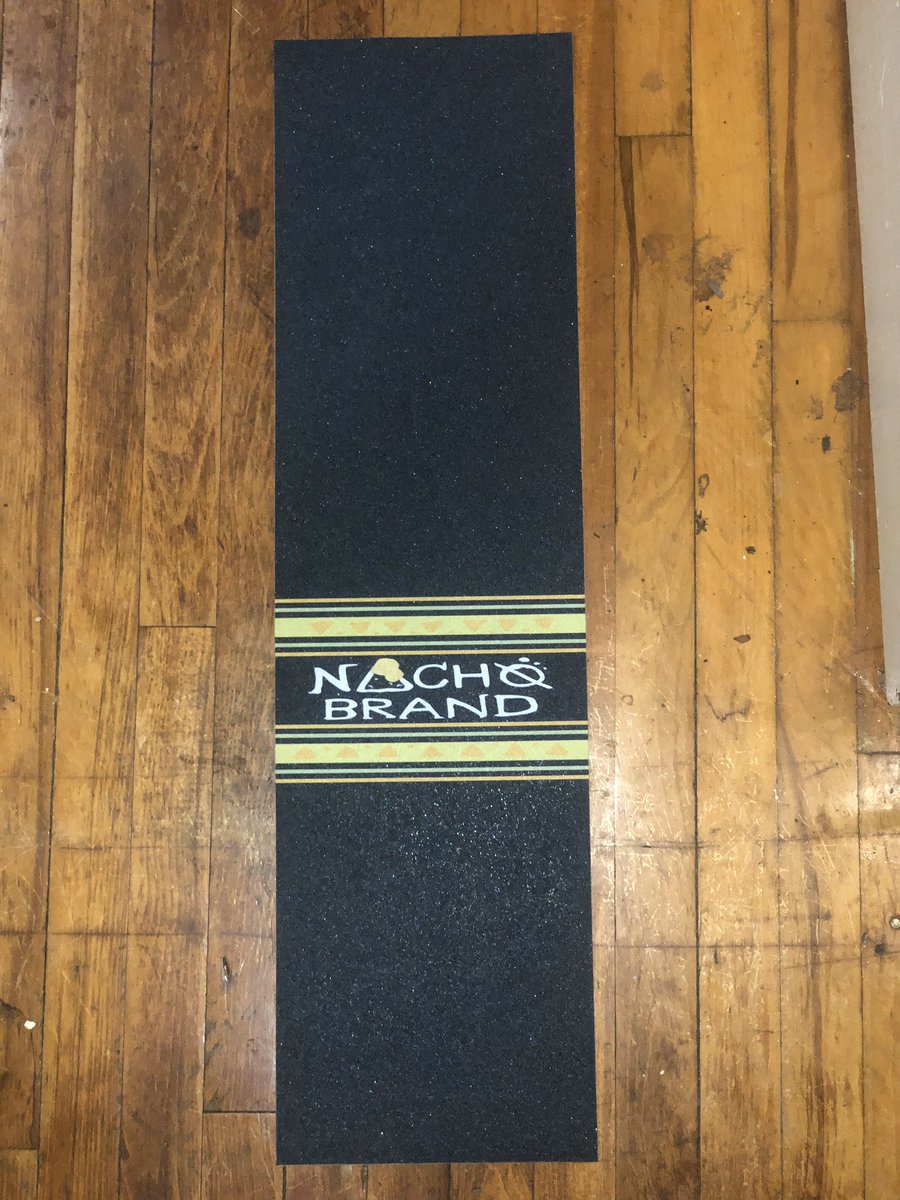 YedaLens's tweet photo. @NachoBrandco first ever OFFICIAL NACHØ Stamp Graphic Griptape 😭🧡🧀💛 has been a dream of mine since 2015 and it’s so surreal to hold and look at these. it’s just the first run &amp; cant wait to improve and see what’s next. ❤️ shoutout to the homies who helped me make this happen https://t.co/fQLlSVmPt5