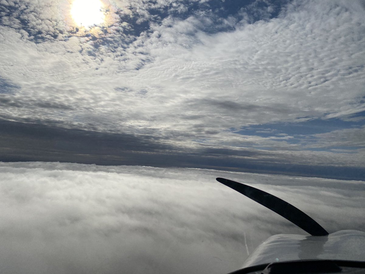 sandwiched between the clouds…#pilotlife #aviation #AvGeek