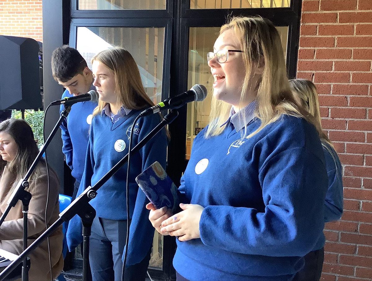 MacswineyCc's tweet photo. Students and teachers perform for An Taoiseach Micheál Martin as he plants a tree to launch College Awareness Week at Terence MacSwiney Community College. We feel privileged to be chosen for such an honour @collegeaware #caw https://t.co/XGJ0GBpwDd