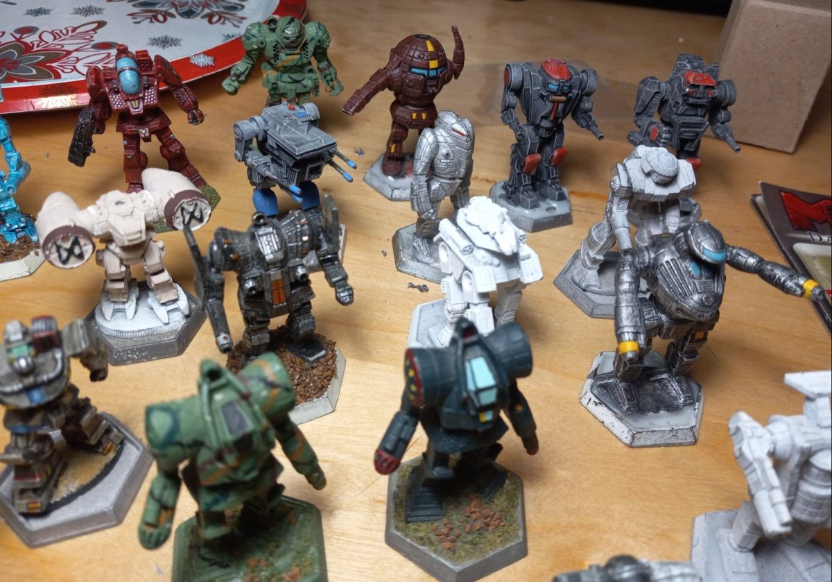 Ranzarok's tweet photo. Found a bunch of my old Ral Partha metal minis from the '80's. Would love to trade for modern plastics. Local swap here I come. #battletech #BattletechBelongsToEveryone #battletechminis #mechwarrior https://t.co/cwyQiYfuDl