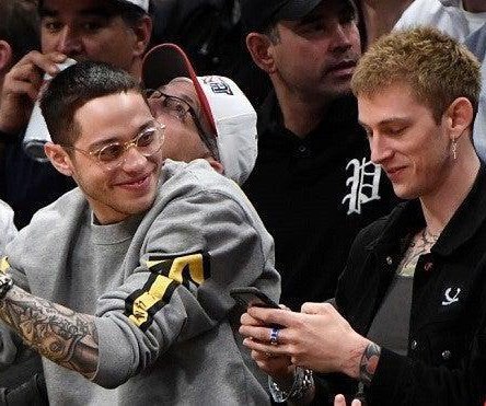 petecomfort's tweet photo. date someone who looks at you the way pete davidson looks at machine gun kelly https://t.co/aG0oJ2M41f