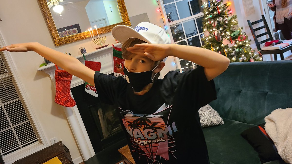 Just gave Alex all my <a href="/DCentralCon/">DCENTRAL Conference</a> swag! He's dressed for NFT success. 😎