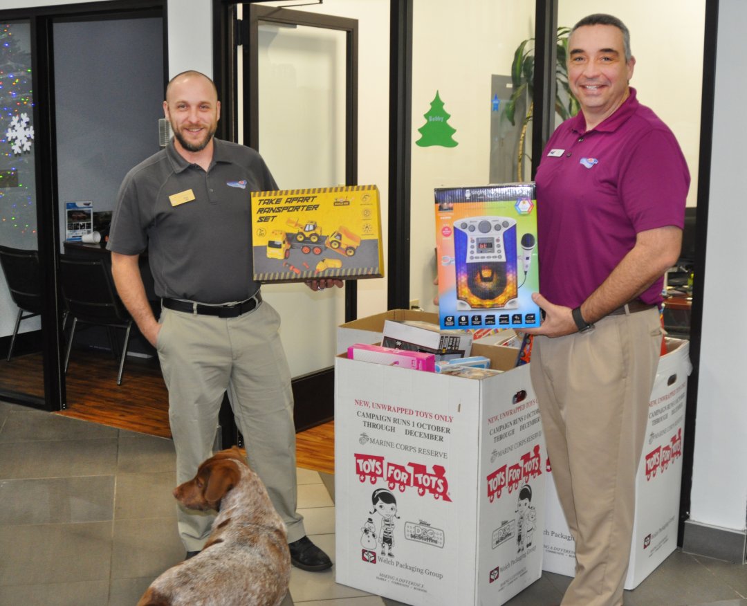 Toys For Tots Collection at Patriot Subaru! Service Department leaders Paul Hall and Glen Reed show off their favorite gifts. #LovePromise #ToysForTots