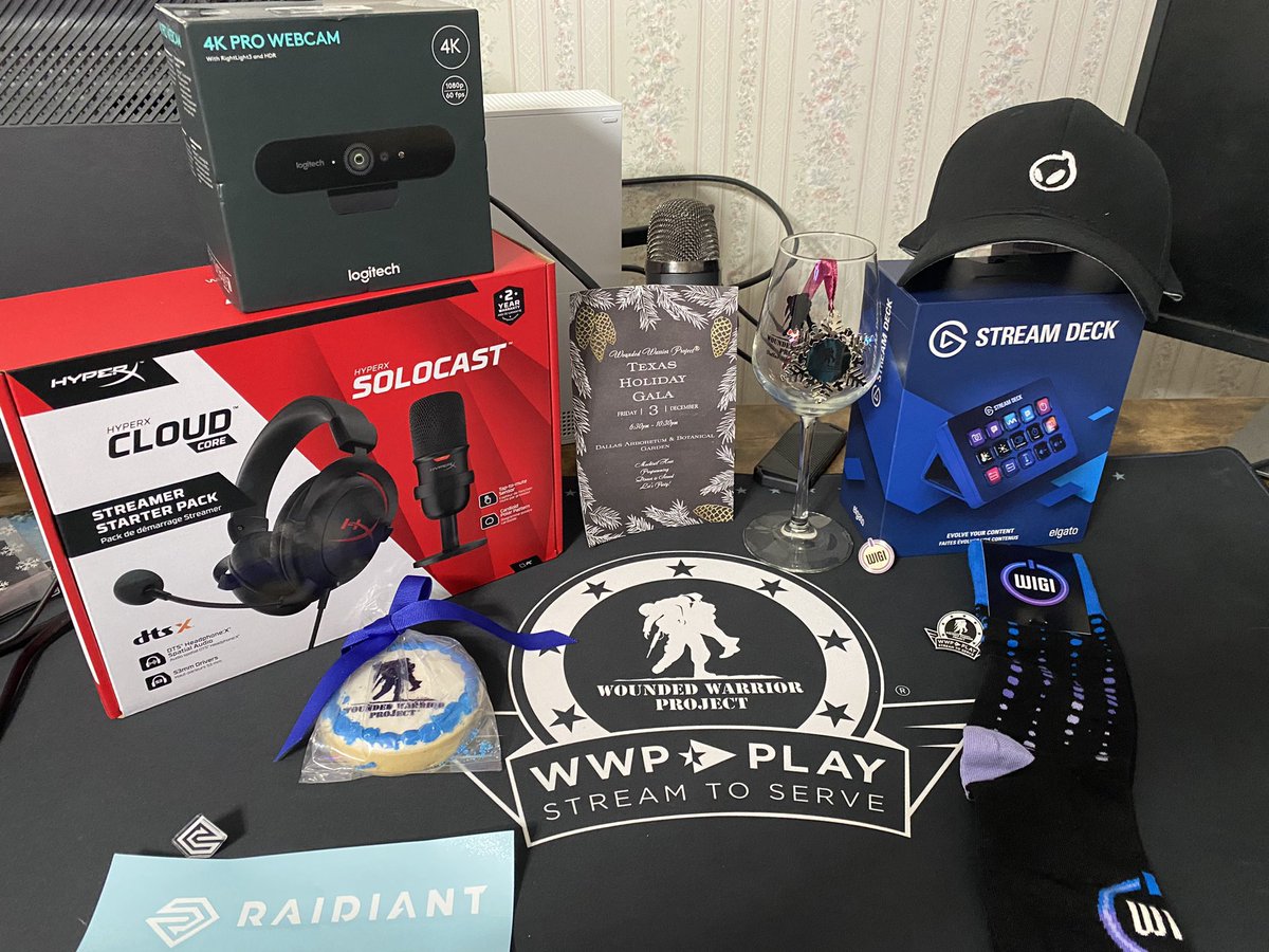 BosnWifey's tweet photo. I get home from Texas to a surprise!  My gift box from #WIGI and #WWPPlay also added in my glass and cookie from last nights Gala. https://t.co/O7VZbMMFlK