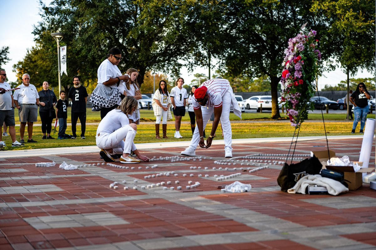 UCF_Football's tweet photo. One Last Knightwalk 🖤💛✌️ https://t.co/NkVl9T02vG