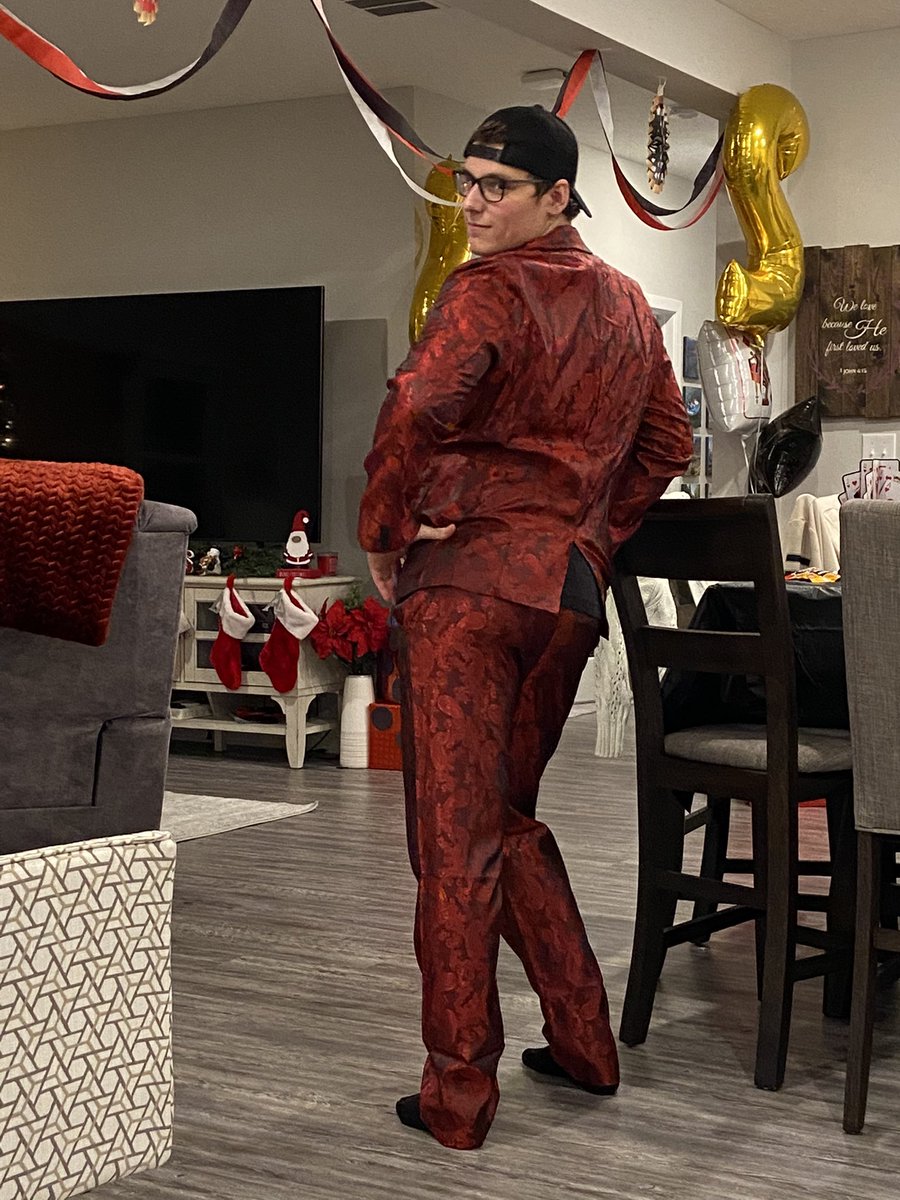 reflectiverae's tweet photo. We celebrated the oldest’s 22nd birthday tonight…he loved his “fancy” cruise suit and instantaneously became a runway model. 😂🤷🏻‍♀️ @ToddEstes10 https://t.co/3idaLRl9nc