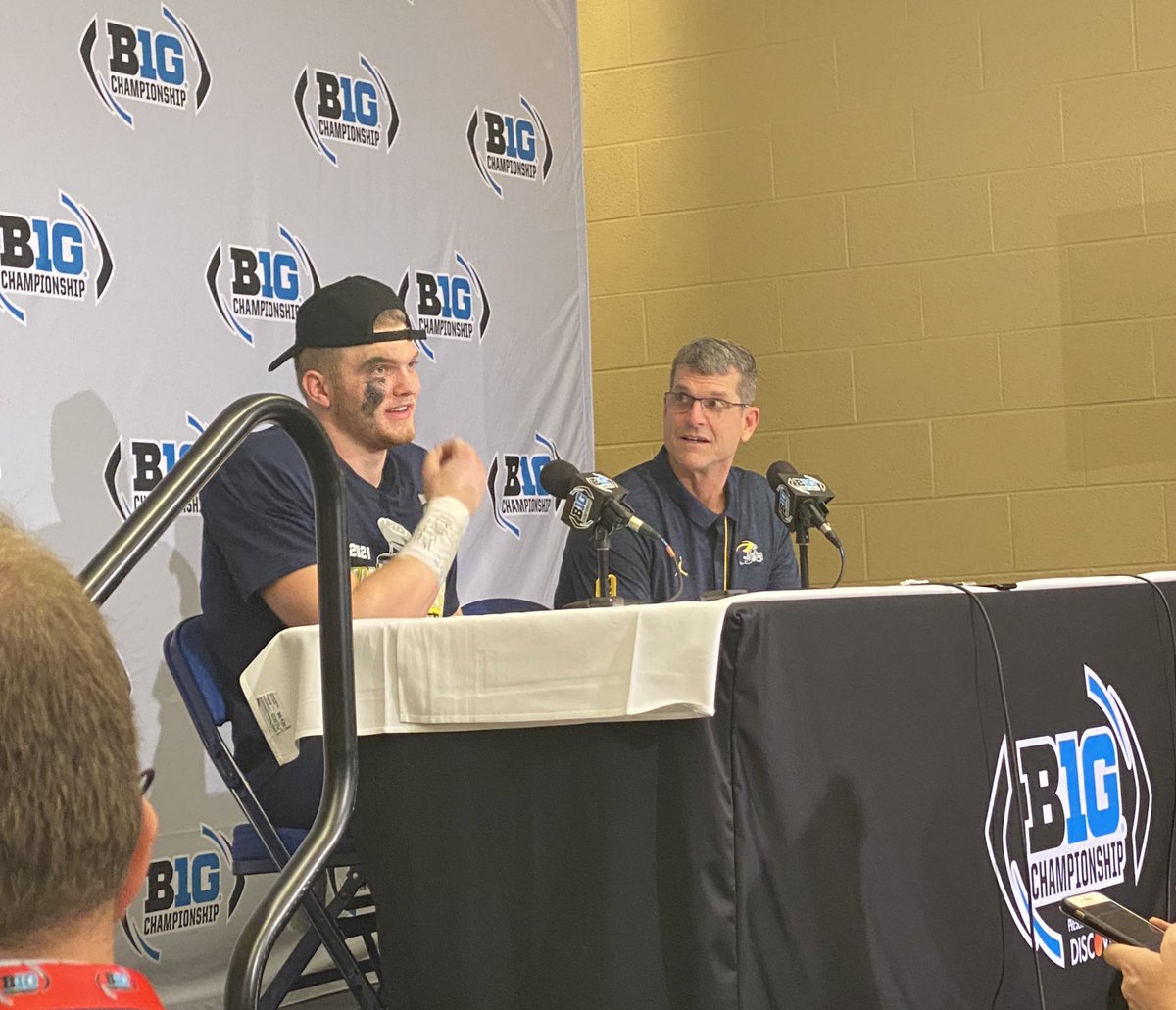 BradGalli's tweet photo. Aidan Hutchinson went to Jim Harbaugh to dedicate the game to Tate Myre. Harbaugh said they looked up and saw 42 points, Myre’s number at Oxford. 

“God works in mysterious ways,” Hutchinson said. https://t.co/LtNZ5n2dJ4