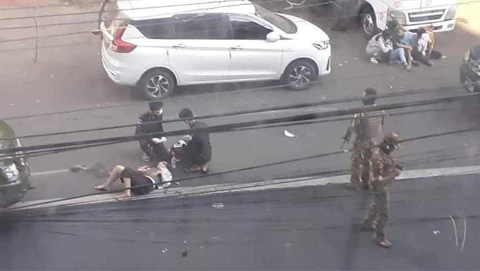 yaminsymo's tweet photo. The military junta hit Yangon young protesters ‘intentionally’ by car when rally goes on Yangon road this morning. This is one of the examples of how young protesters are killed brutally by military junta these days! 
#WhatsHappeningInMyanmar #Dec5Coup https://t.co/AJNYly9jOK