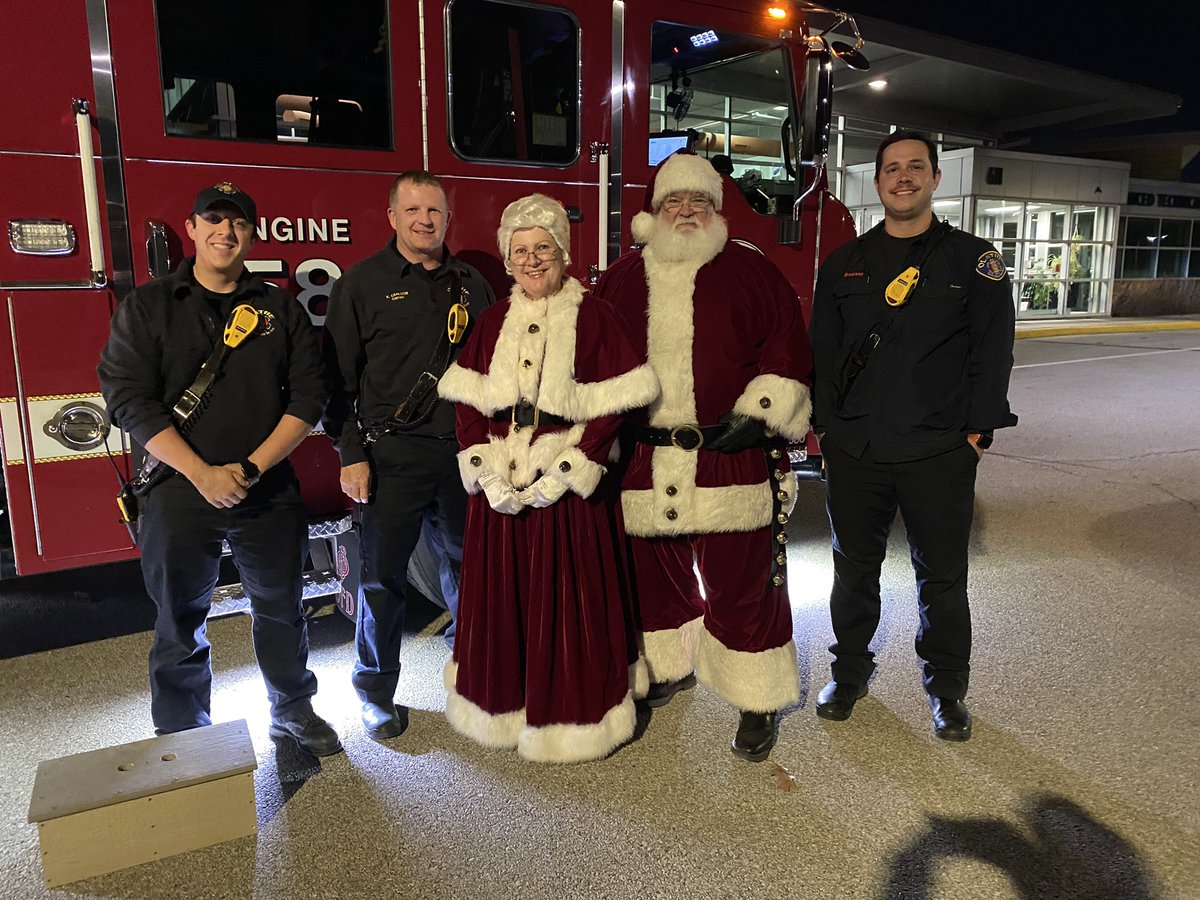 OlatheFire's tweet photo. Last Friday, the crew of Engine 58 had the pleasure of being Mr. and Mrs. Claus’ sleigh ride. 

#Santa didn’t want to park his #sleigh downtown for fear it would get mistle-towed by @OlathePolice … 

😬😬😬😬😬 https://t.co/OgO6fSMpJZ