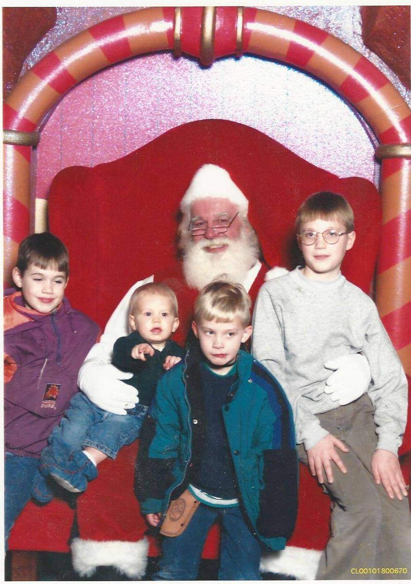 CindyHval's tweet photo. My favorite Santa photo of my 4 sons. Even though Washington's an open carry state I wouldn't let the 5-year-old pack heat for a Santa visit. That didn't stop him from wearing his holster. #boymom #Santa #santaphoto #guns #makemydaysanta #memories #sundayvibes https://t.co/ied3AXdpw4