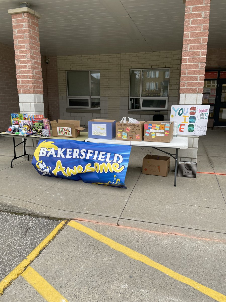 Setting up for our Drive Thru Toy Mountain and food drive!  1-3 today in the bus loop!  Can’t wait to see you!