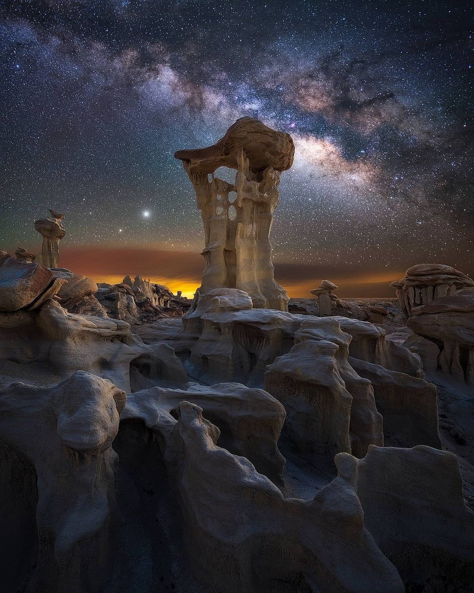Alien Throne An otherworldly rock spire (also known as a hoodoo) rises out of the badlands forming a perfect foreground to the Milky Way galaxy above. 📸: Marcin Zając