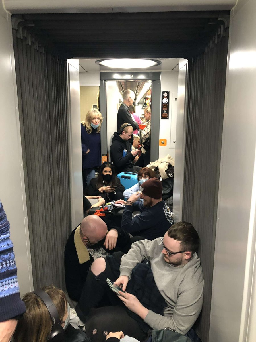 _LSutherland_'s tweet photo. Absolute joke on the @GC_Rail tonight, 3 trains worth of people packed onto one train and getting screamed at by the staff to ‘move down’ and ‘squash together’.  #grandcentral https://t.co/zaRRByYXP3