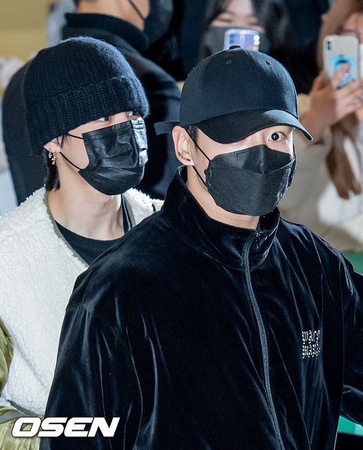 All of BTS Wore Face Masks to the Airport This Morning Except for