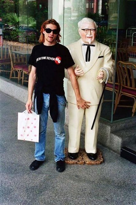 crockpics's tweet photo. Kurt Cobain with Colonel Sanders in Singapore, 1992. https://t.co/BHIbKX2HsX