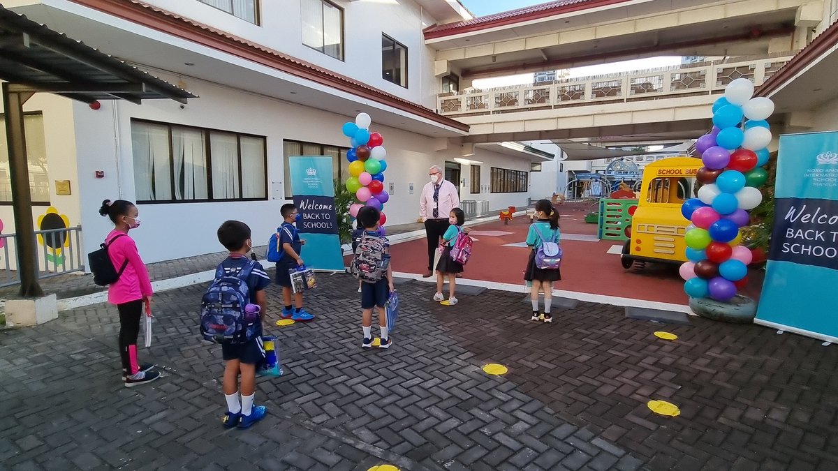 NAISManila's tweet photo. Our very first student back, Rafael from Year 4! 

And students being welcomed by our Principal, Mr. Pooley, and their teachers.

#NAISManila #hybridlearning
#blendedlearning
#FacetoFaceClass
#internationalschool #InternationalStudents https://t.co/BItCmdL7eH