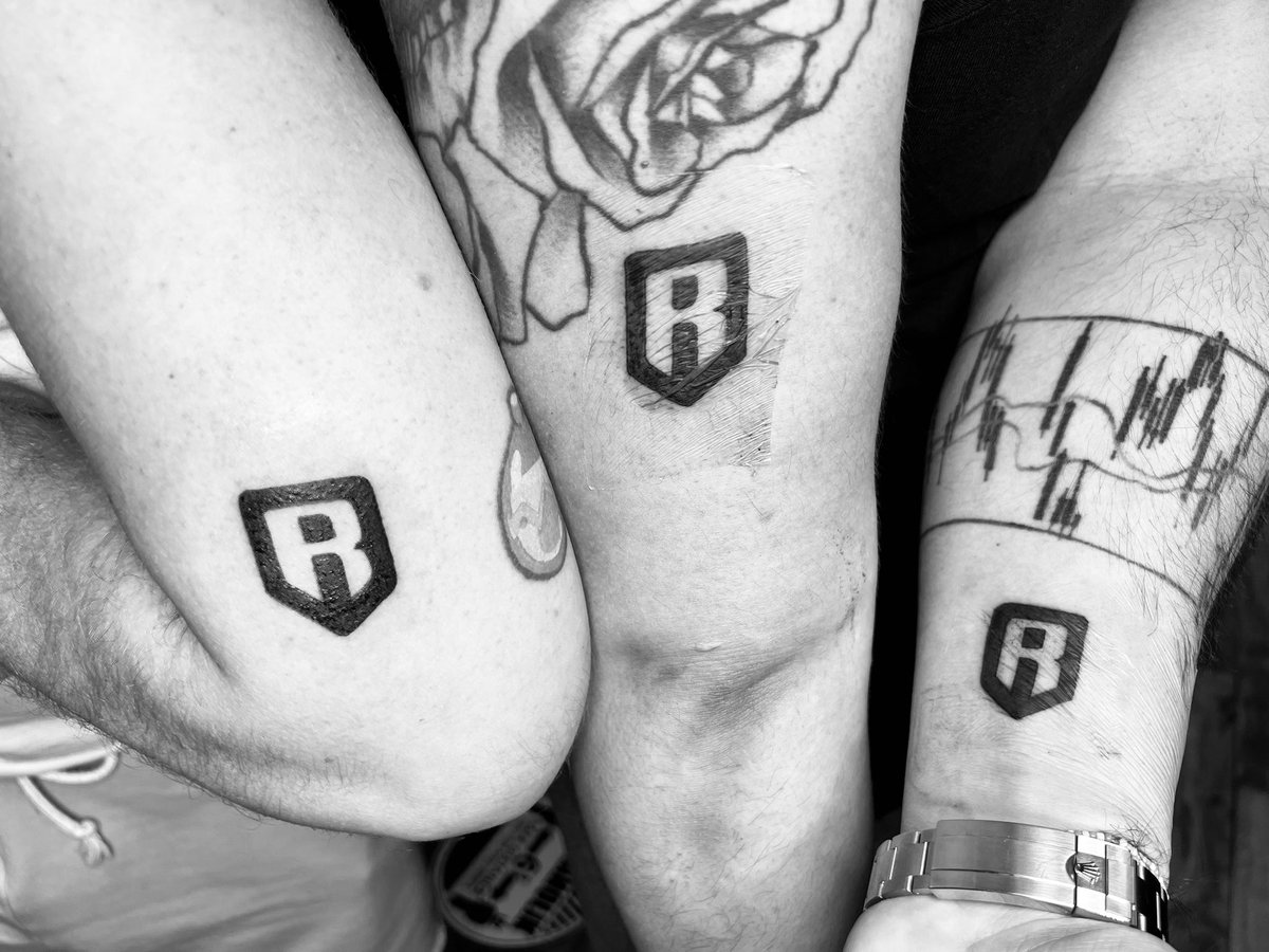 OsitoLimaX's tweet photo. The first 3 $RON tattoos in the world ❤️🚀 I love you my brothers @cloudwhite @gocholive @AxieInfinity https://t.co/PT01aKo9rH