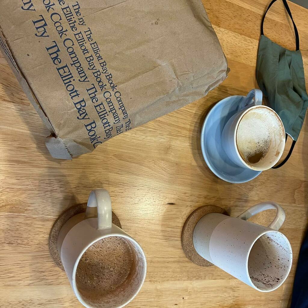 JayeViner's tweet photo. Nice break from the con visiting the Capitol Hill neighborhood. Bought some books @elliottbaybookco and sampled the hot chocolate and coffee @reyamargo_us 

Apparently there is a hot chocolate revolution in the works out here. So many options to try! 

Image tag: table with … https://t.co/0h6i1MA2OM