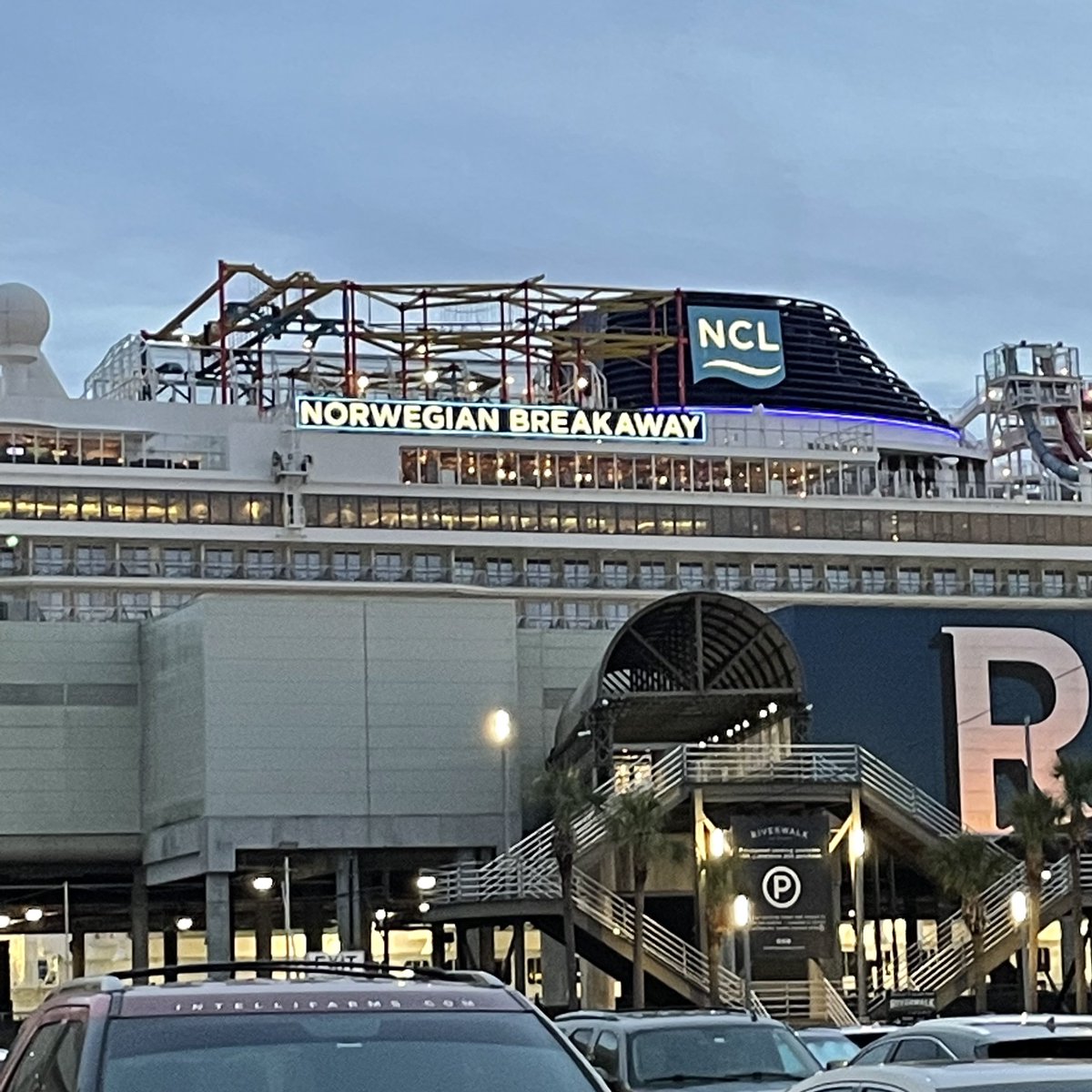 A COVID-ridden cruise docks behind outlet mall in New Orleans.