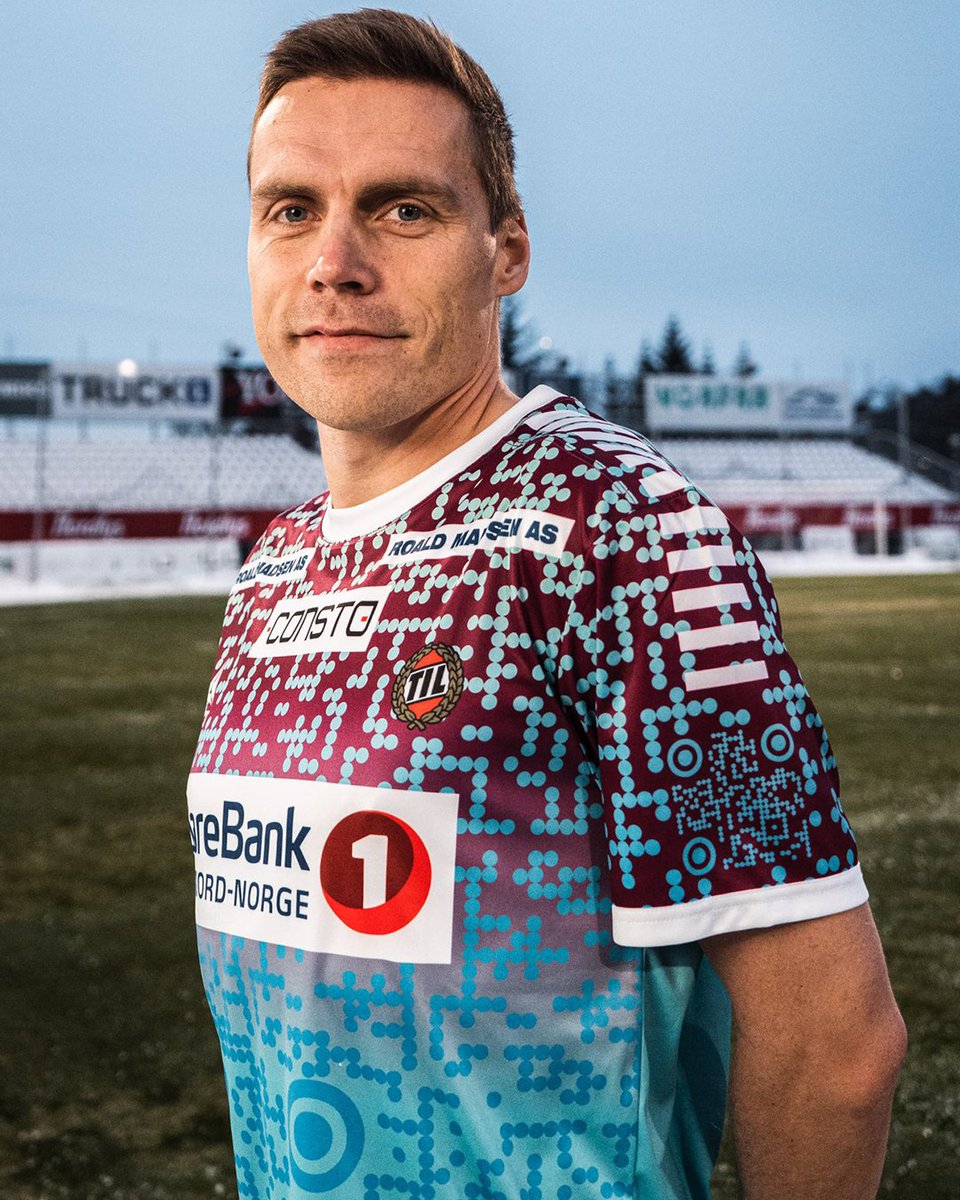VidafanCo's tweet photo. Norwegian side Tromso has launched a kit to highlight "sportswashing" in Qatar.

It teamed with Amnesty Intl. &amp; Malcolm Bidali, who was placed in solitary confinement after blogging about "inhumane" working conditions in Qatar, to create the first football shirt with a QR code. https://t.co/KDuTvpn8Rx