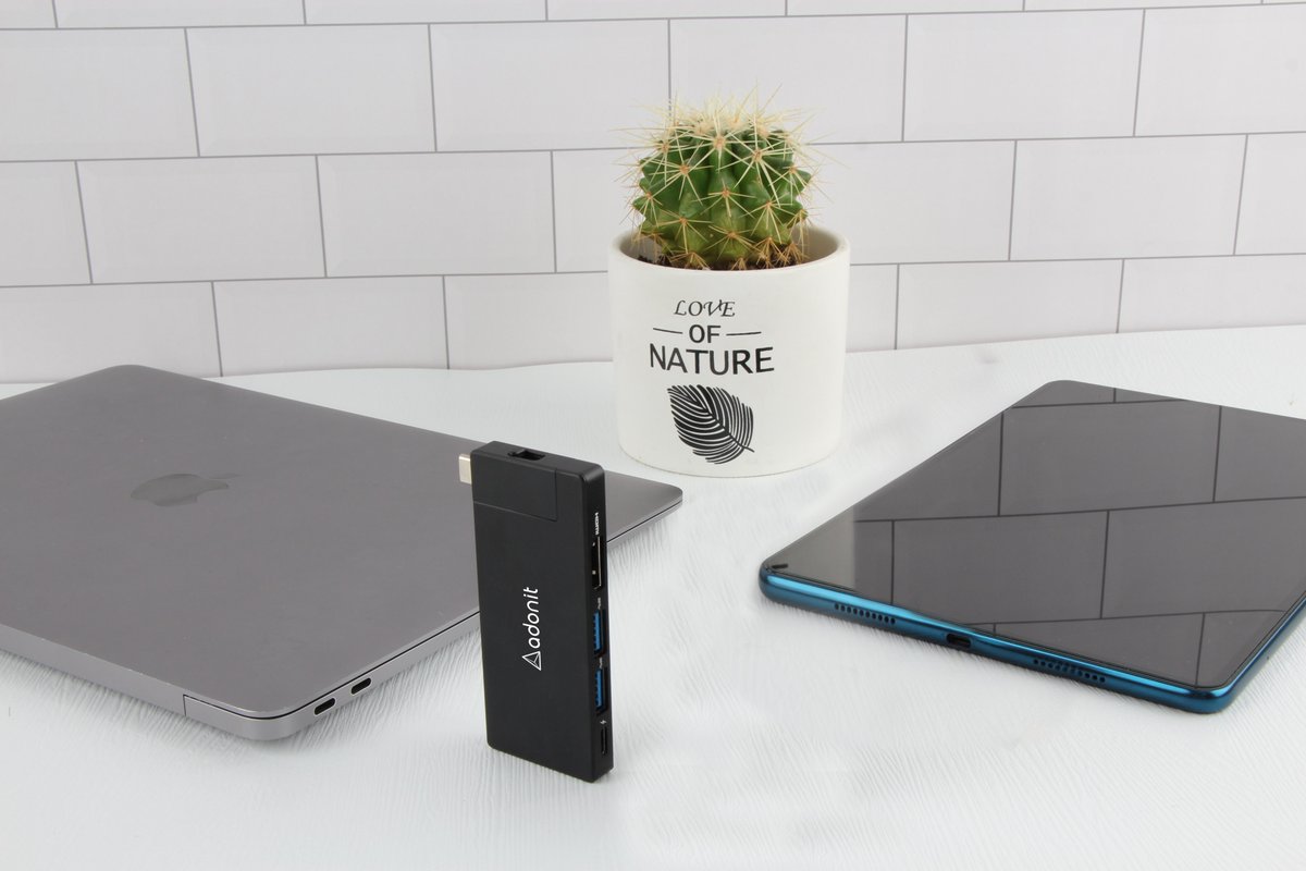 This USB-C docking station attaches to the side of iPad adding 5 ports!