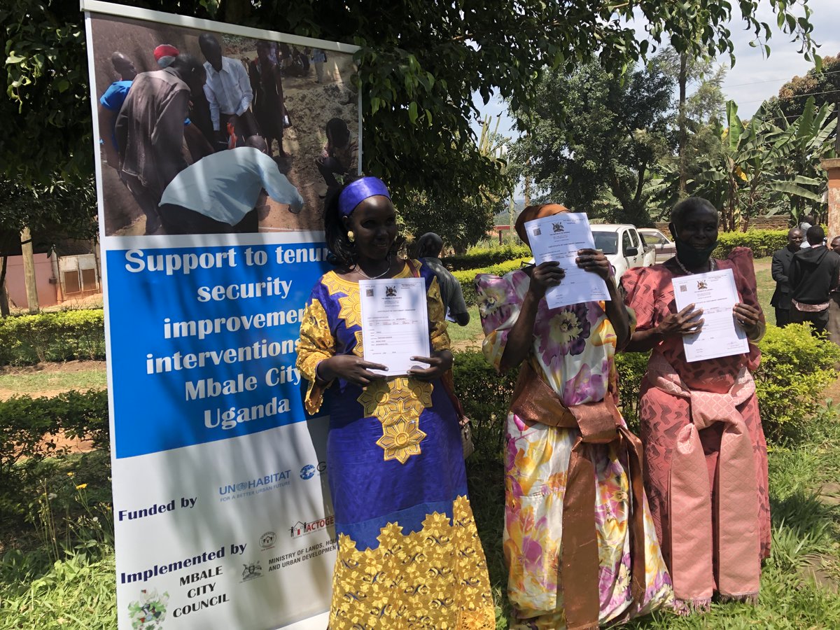 Three of the over 500 Mbale residents who received certificates of customary ownership Photo: ACTogether Uganda