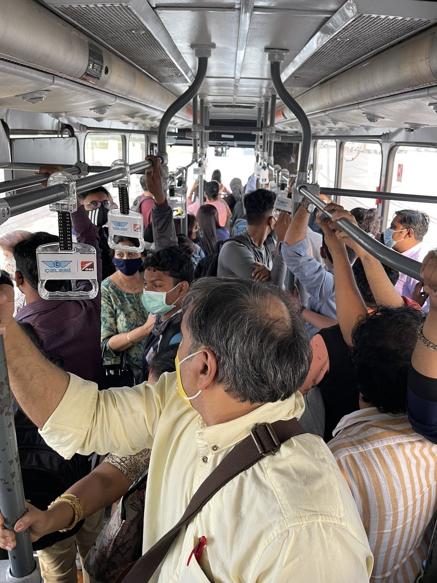 sriramram's tweet photo. While we are all preaching social distancing, this is the way GoFirst airline is overloading buses from aircraft to terminal in Bengaluru! Is this social distancing? @GoFirstairways @WadiaNess @DGCAIndia https://t.co/20BZeRDSvG