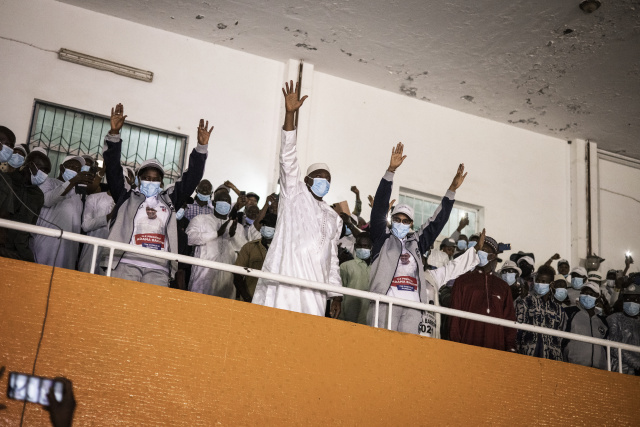 BarkisuB's tweet photo. President Adama Barrow comfortably won a second term in The #Gambia's presidential election, with thousands of his supporters celebrating in the streets of Banjul, although his opponents disputed the results announced late Sunday. #GambiaDecides2021 https://t.co/hGl14hUrO4