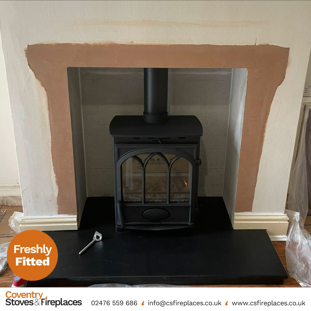 csfireplaces's tweet photo. The large Fireline FT8 multi-fuel stove, featuring a Gothic-design Tracery Arched door, 8kW heat output and Ecodesign-ready credentials —fully fitted by our in-house HETAS engineer.👨‍🔧

@cJfires 

#coventry #kenilworth #nuneaton #leamington #solihull #stratford #warwickshire https://t.co/hDGxFQy3GS