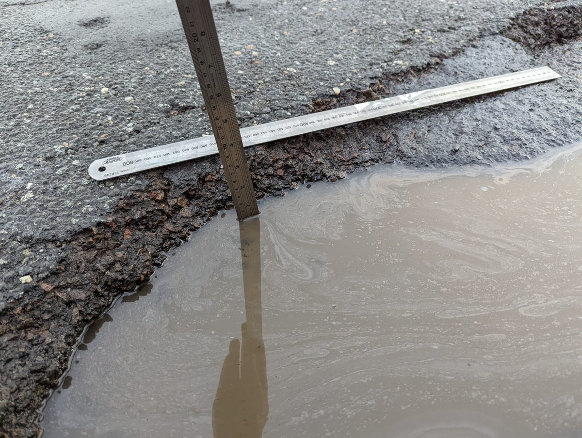 ewanjohnstone's tweet photo. @Aberdeenshire there are some awful potholes on the B9170 at old Meldrum. I took photos today to prove that they are still there despite your roads department closing my ticket to say they are repaired. This is unacceptable to lie and close the issue. https://t.co/jewnYzAxcb