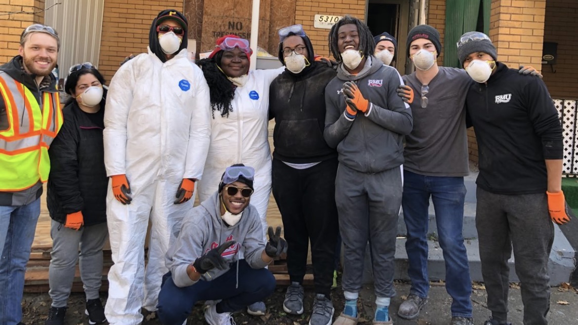 RMU's tweet photo. On Saturday, the RMU Black Student Union and other volunteers helped restore houses in East Liberty as part of the the Open Hand Ministries Restoration Project 🏡 https://t.co/k19kWMlo9V