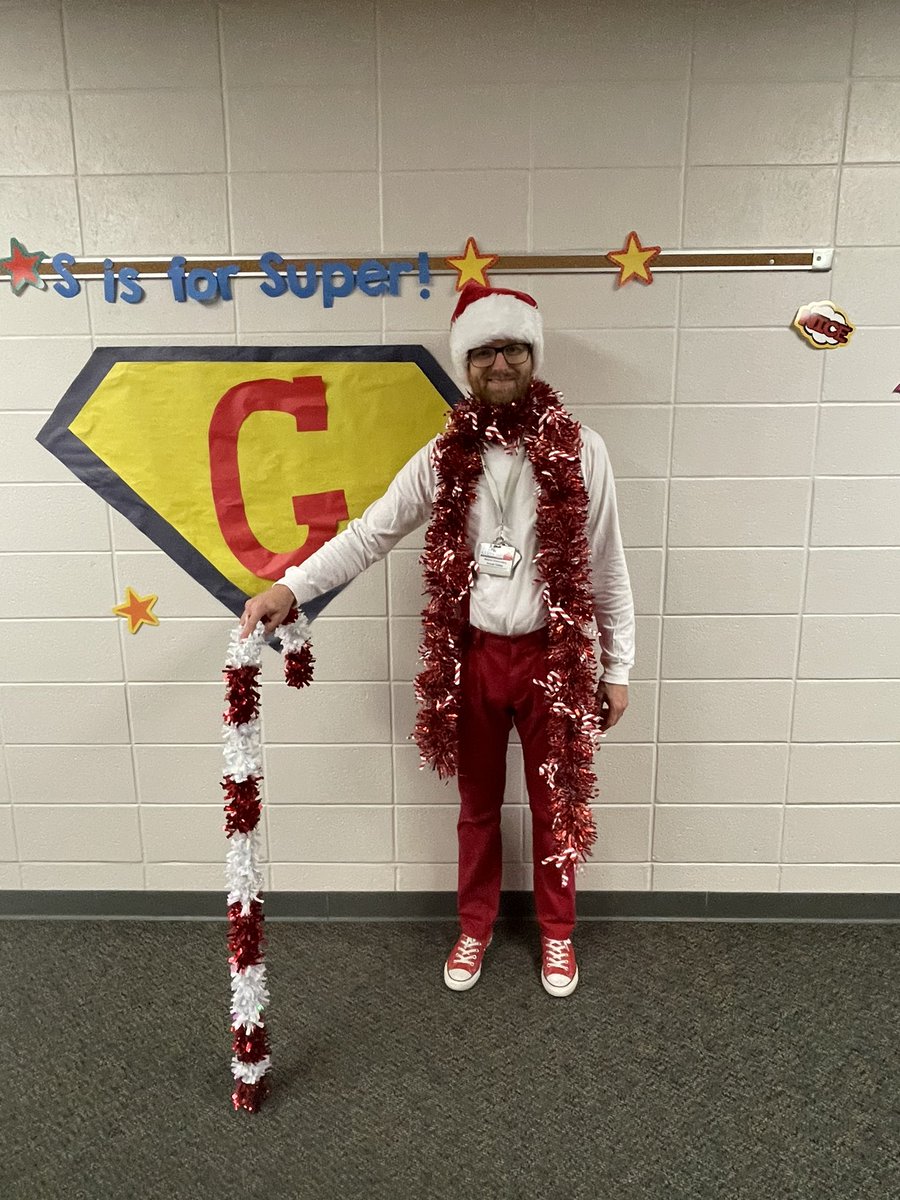 MetzlerKISD's tweet photo. “Dress like a candy cane.”  @gibbs_teacher understood the assignment. https://t.co/F1hpTtULBV