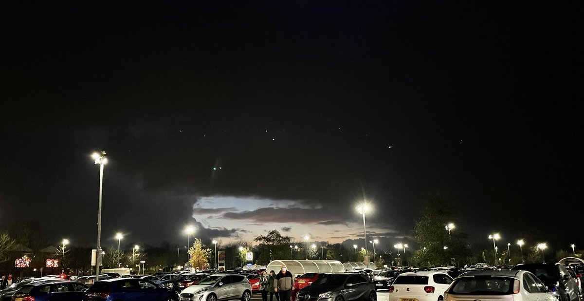 SpaceNessie's tweet photo. #TeamSpace, what do we think about the lights in this photo? Let’s come up with a sensible theory. It was taken today in Midlands, Merry old England. Not behind glass. Lights were seen with their own eyes. Clouds in background! Guesses? #NotJeff #NotElon https://t.co/ms8jCRCgQV