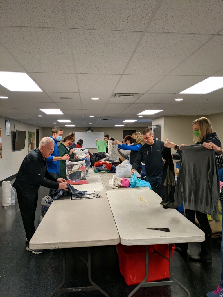 MasterProvision's tweet photo. We were so blessed to welcome a huge group from @StElizabethNKY Foundation today! They helped sort clothing bound for our international missions. Thank you and God bless! https://t.co/yJ6xJc0xAx